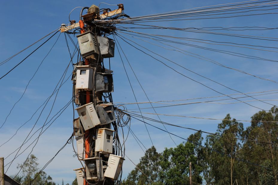 An ad hoc collection of electricity meters are barnacled onto a power pole in India. While smart meters have been in use in the United States and Europe for more than a decade, in markets such as Africa they are set to encourage much-needed investment in the sector.