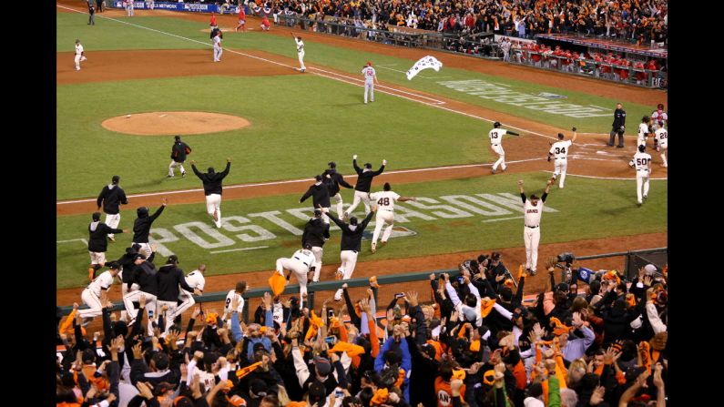 The San Francisco Giants celebrate after Travis Ishikawa's walk-off homer clinched the National League pennant on Thursday, October 16. The Giants defeated the St. Louis Cardinals 4-1 in their best-of-seven series.