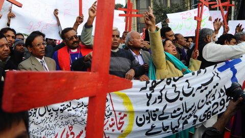 Members of the Pakistan Christian Democratic alliance march during a protest in Lahore on December 25, 2010, in support of Asia Bibi, a Christian mother sentenced to death under blasphemy laws. Arif Ali/AFP/Getty Images)