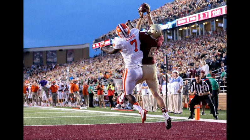 Josh Bordner of Boston College reaches over Clemson's Tony Steward to catch a touchdown pass Saturday, October 18, in Chestnut Hill, Massachusetts. Clemson won the game, however, by a score of 17-13.