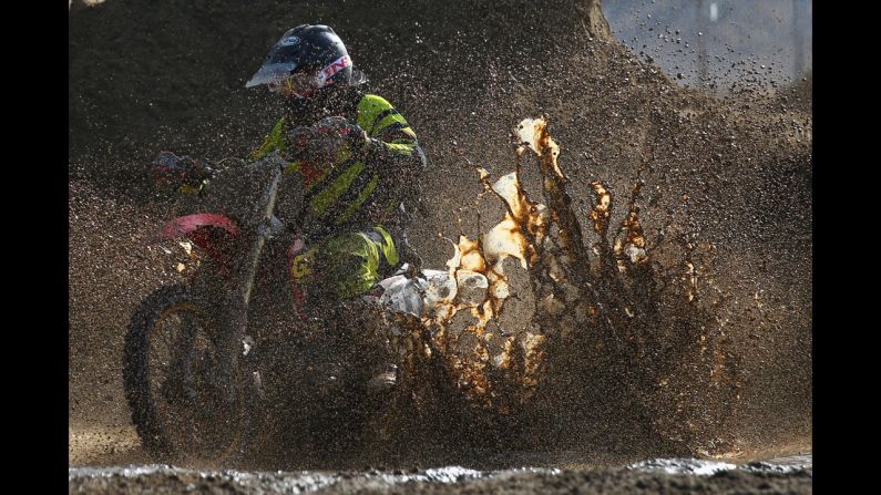 A competitor plows through heavy mud Sunday, October 19, during the Weston Beach Race in Weston-super-Mare, England.