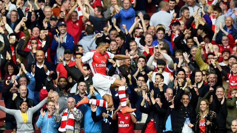Arsenal's Alexis Sanchez celebrates after scoring the opening goal against Hull City during a Premier League match Saturday, October 18, in London. Hull fought back to earn a 2-2 draw.