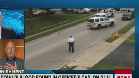 Sources: Brown's blood on cop's car, uniform