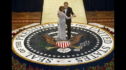 And in 2005, first lady Laura Bush wore a sophisticated silver de la Renta gown to celebrate the inauguration of her husband, President George W. Bush.  