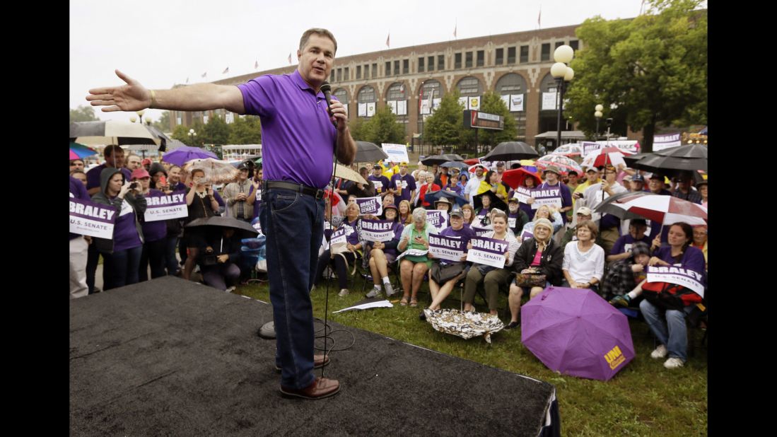 Braley talks to fairgoers in August at the Iowa State Fair in Des Moines. With just weeks left in the race, the congressman brought in high-profile campaigners such as first lady Michelle Obama.