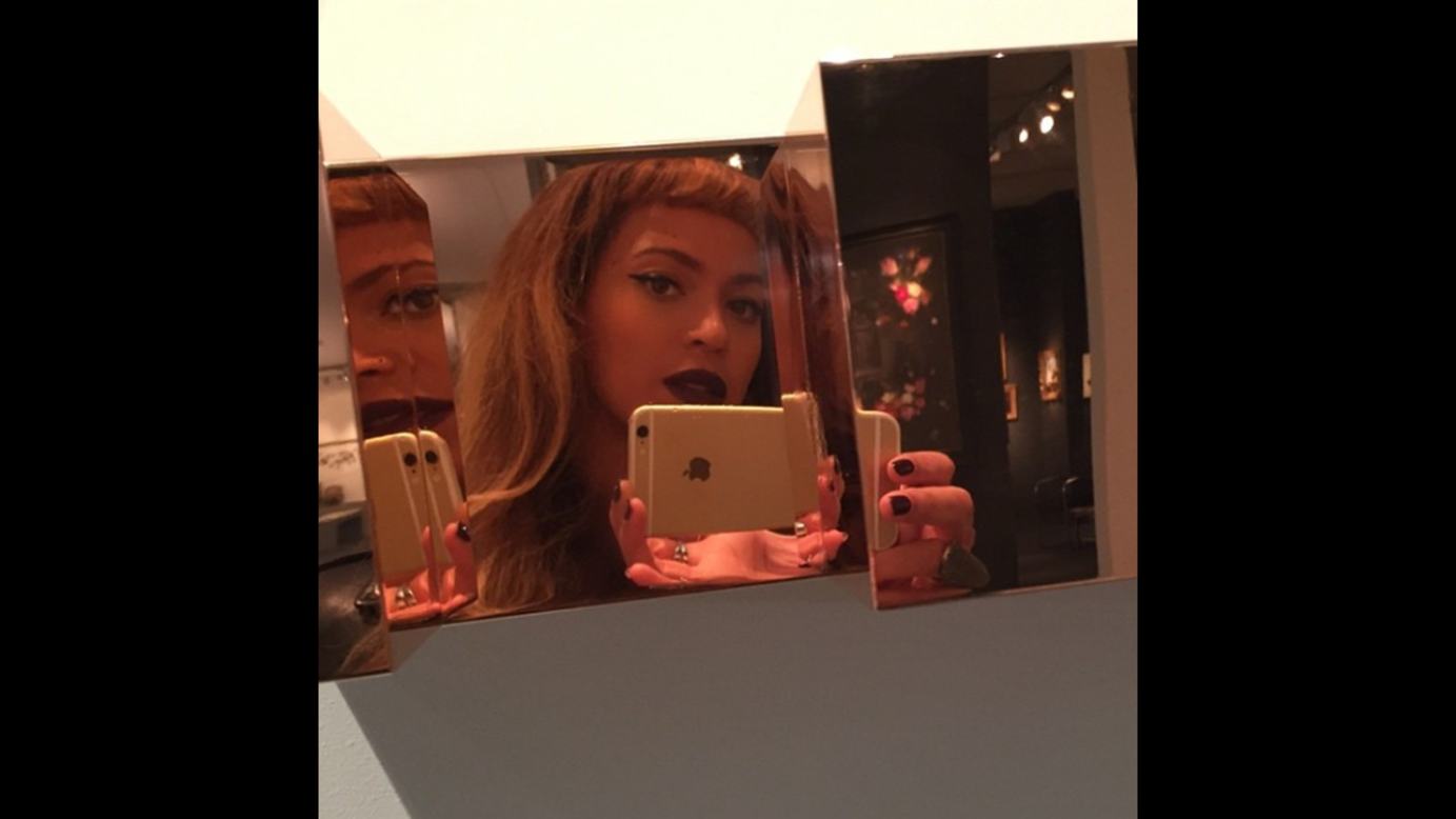Beyonce's reflection is seen in a mirror as the singer/actress <a href="http://instagram.com/p/uQVw46Pw7N/?modal=true" target="_blank" target="_blank">snaps a selfie</a> on Friday, October 17.