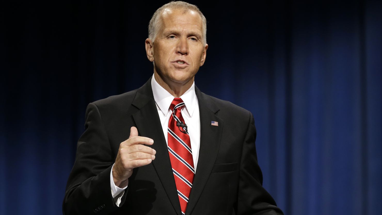 North Carolina Republican Senate candidate Thom Tillis makes a comment during a live televised debate with Sen. Kay Hagan, D-N.C., at UNC-TV studios in Research Triangle Park, N.C., Tuesday, Oct. 7, 2014. 