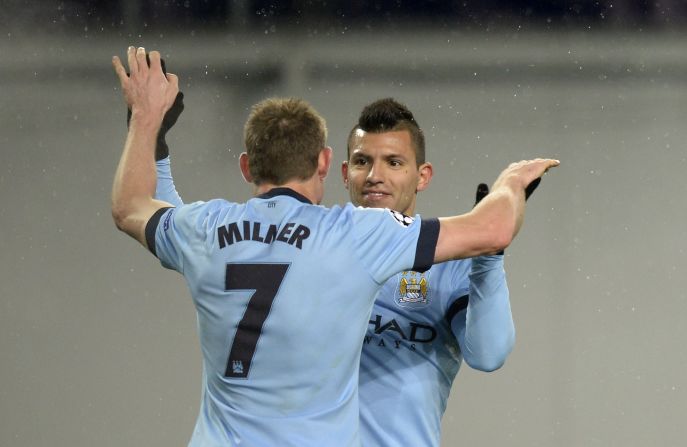 Manchester City raced into a two-goal lead in its clash with CSKA Moscow, played behind closed doors after the Russian club were found guilty of racism among its fans. Here, midfielder James Milner celebrates his goal with its creator, Sergio Aguero, who grabbed City's first.