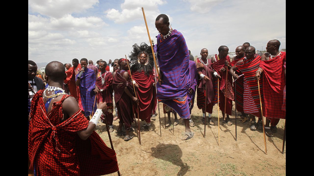 Maasai men prepare to greet Camilla, Duchess of Cornwall, and Prince Charles as they visit Majengo Maasai Boma in 2011 in Arusha, Tanzania. The lifestyle of the Maasai, one of the last warrior tribes in the world, revolves around cattle herding.