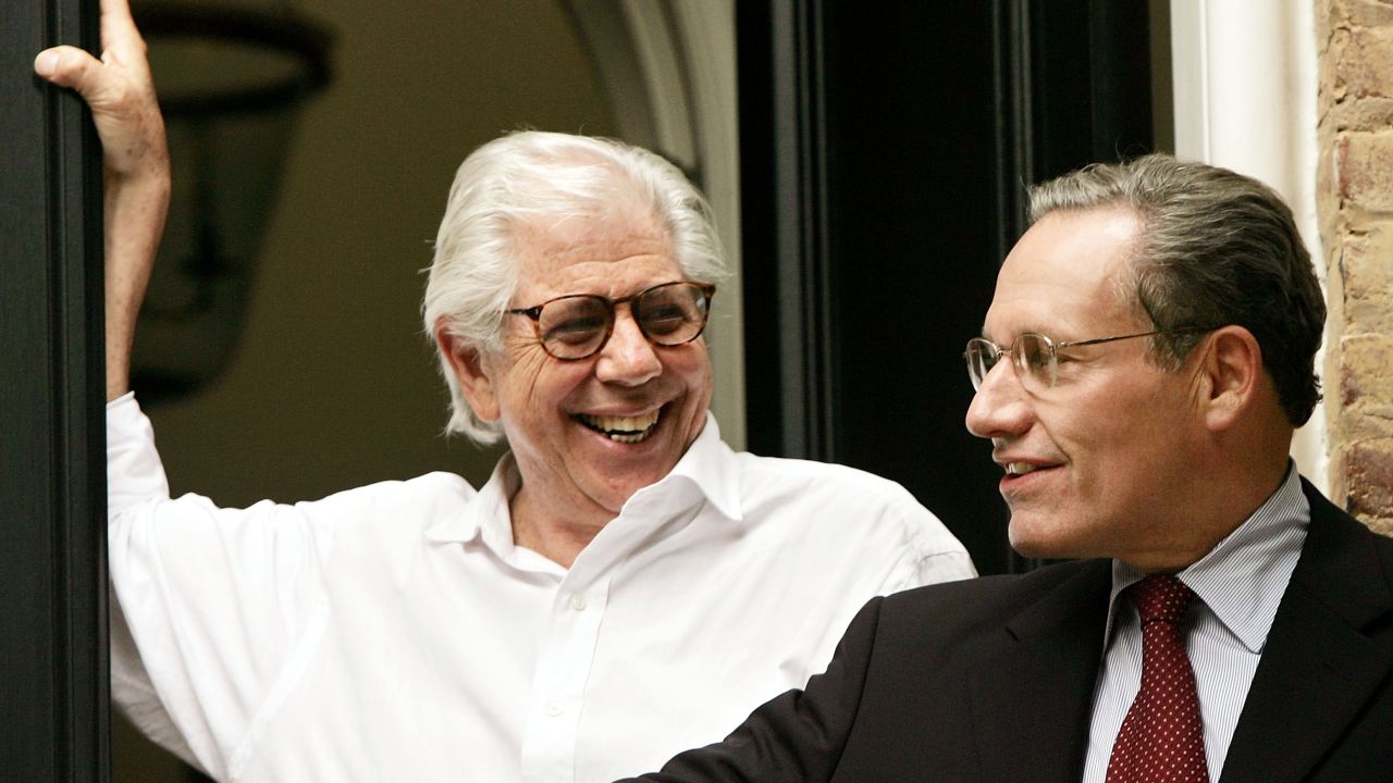 Bernstein, left, and Woodward speak to reporters in June 2005, after the identity of their Watergate scandal source "Deep Throat" was confirmed to be former FBI official Mark Felt.