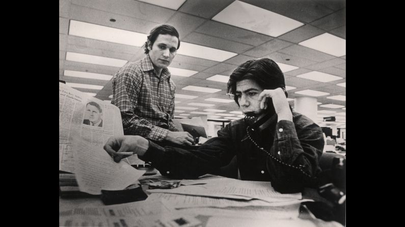 In April 1973, Woodward, left, and Bernstein work the Watergate story from the Washington Post newsroom.  
