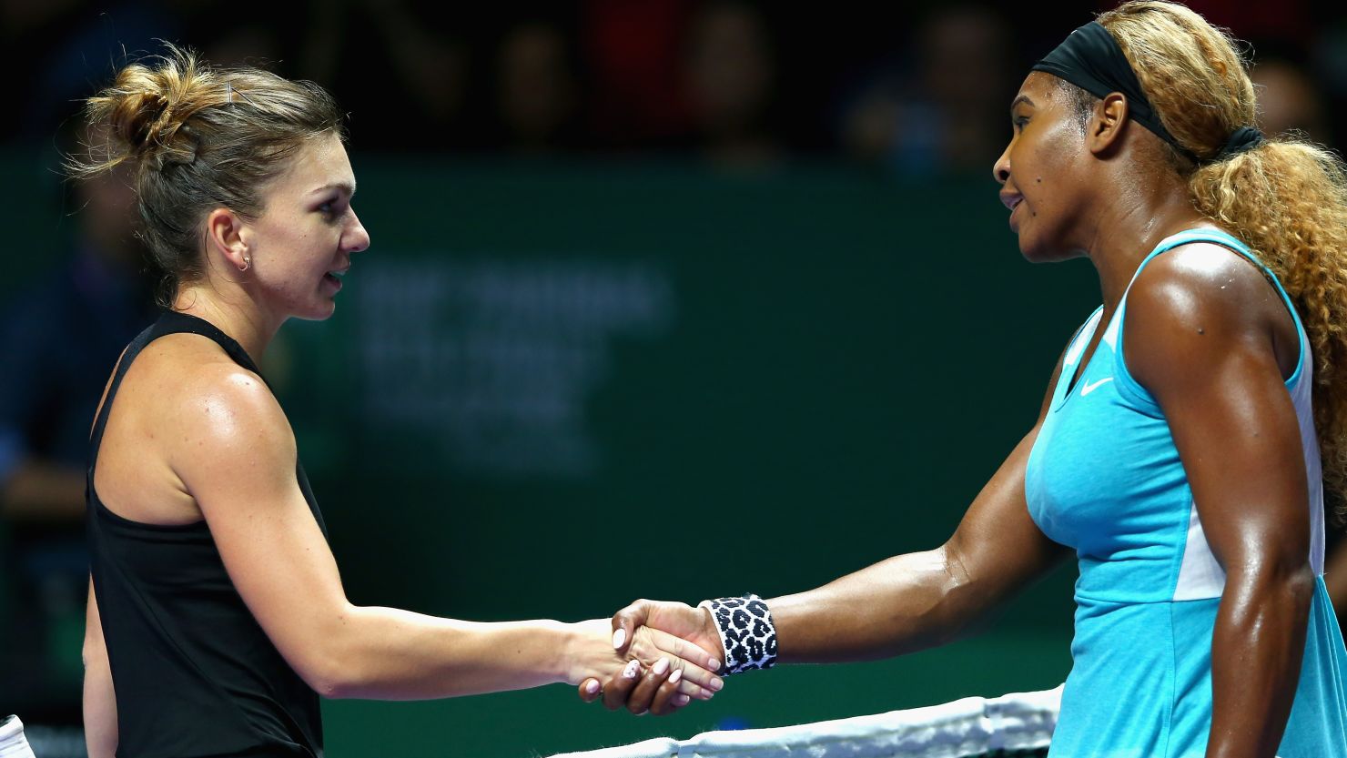 Serena Williams congratulates Simona Halep following the Romanian's sensational win in the group stages of the WTA Finals.