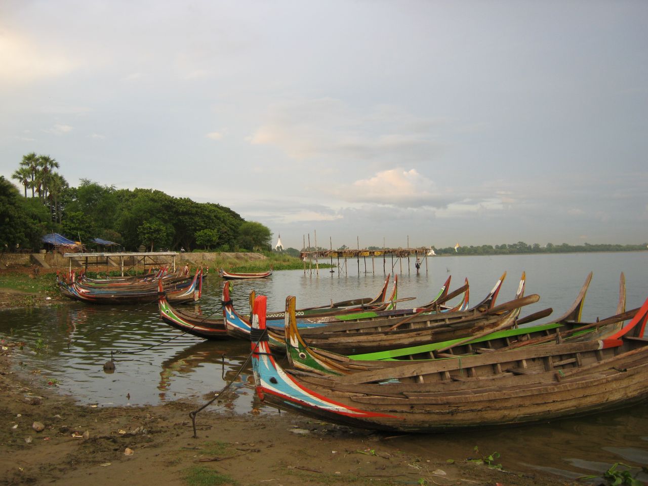 Colorful boats dock along the banks of <a href="http://ireport.cnn.com/docs/DOC-878952">Taungthaman Lake</a> near Amarapura, Myanmar. Locals from nearby villages use these boats to commute to work daily.