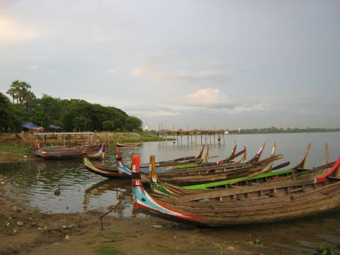 Colorful boats dock along the banks of <a href="http://ireport.cnn.com/docs/DOC-878952">Taungthaman Lake</a> near Amarapura, Myanmar. Locals from nearby villages use these boats to commute to work daily.  