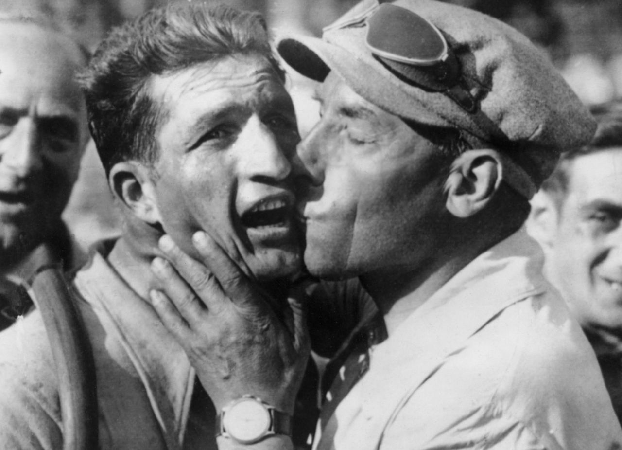 Bartali is congratulated by his team sports director Costante Girardengo after winning on July 18, 1938, the 11th stage of the Tour de France between Montpellier and Marseille.
