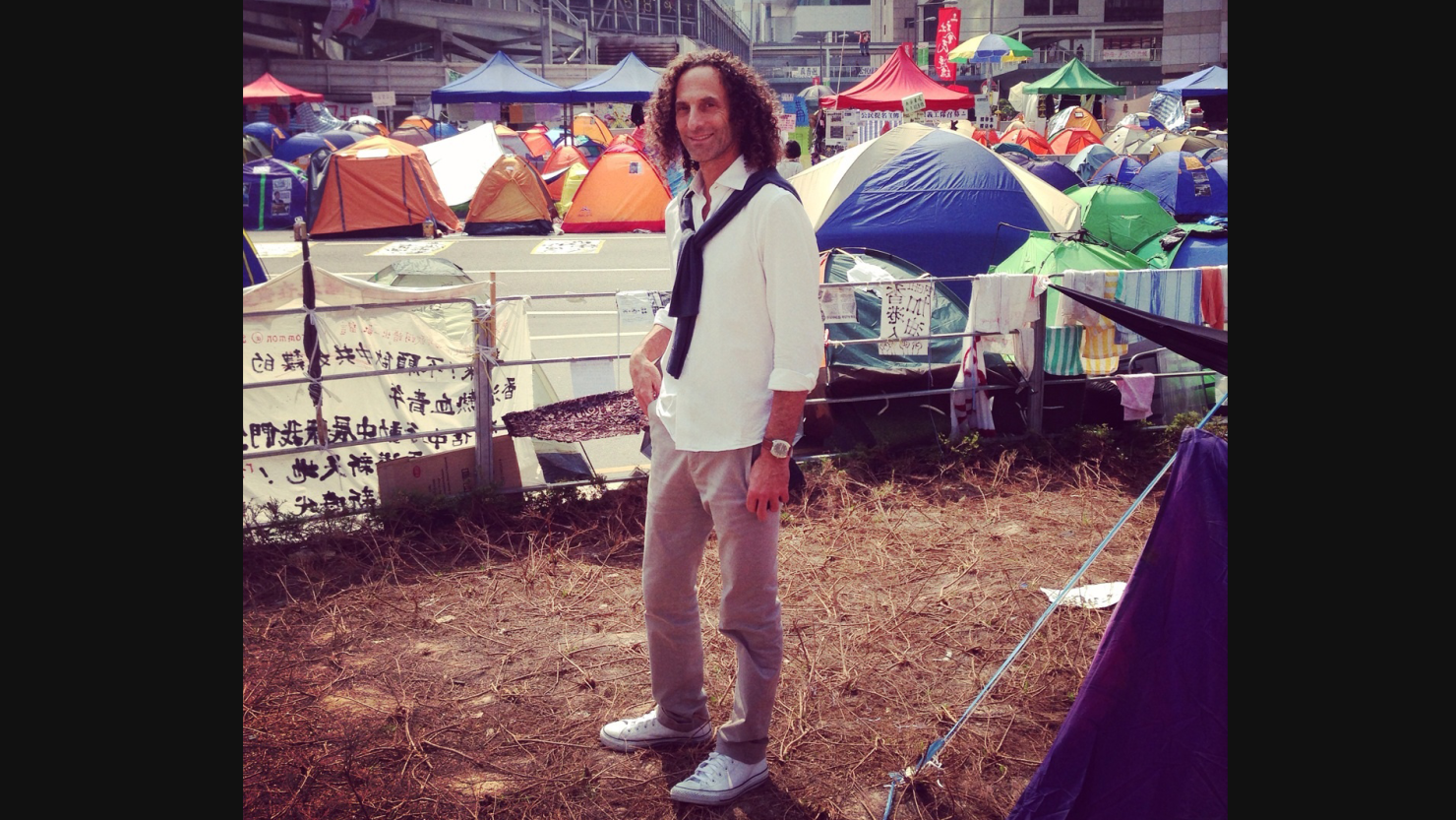 CNN's Elizabeth Joseph saw jazz musician Kenny G walking around the Hong Kong protest site on October 22 and took this photo, which quickly went viral. The musician also took a selfie, which has since been deleted.