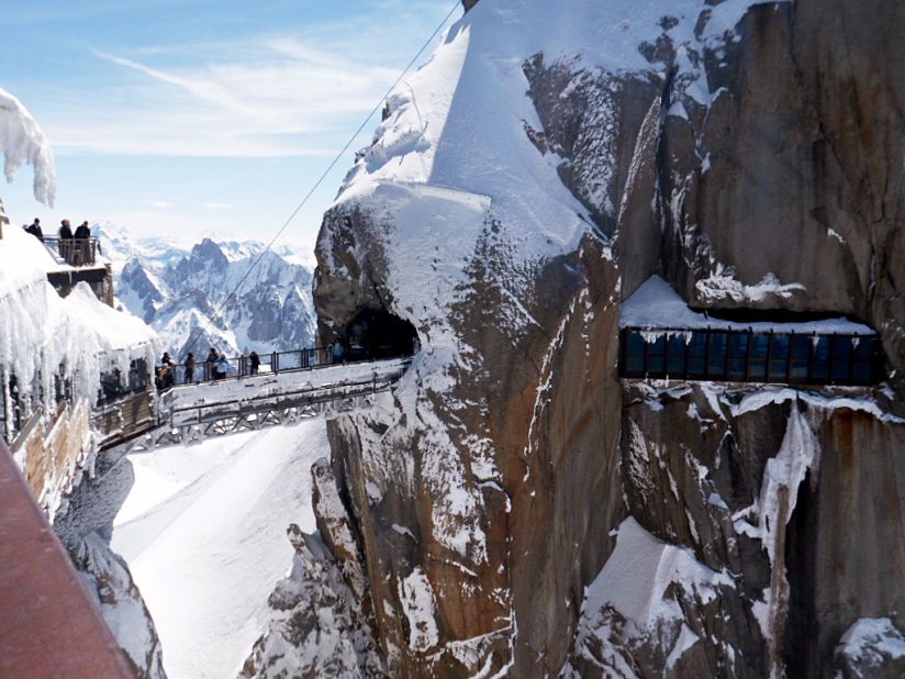 <strong>Aiguille du Midi Bridge (France): </strong> Aiguille du Midi Bridge is located 3,842 meters above sea level. To get to it, you're going to have to ride a vertical ascent cable car. 
