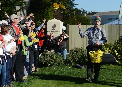 Murray, an avid golfer, passes caps to fans on the 17th hole during the third round of the AT&T Pebble Beach National Pro-Am in 2013. He can often be found on a course -- if not <a href="http://www.theguardian.com/world/2007/aug/23/film.filmnews" target="_blank" target="_blank">driving a golf cart where it shouldn't go</a>.