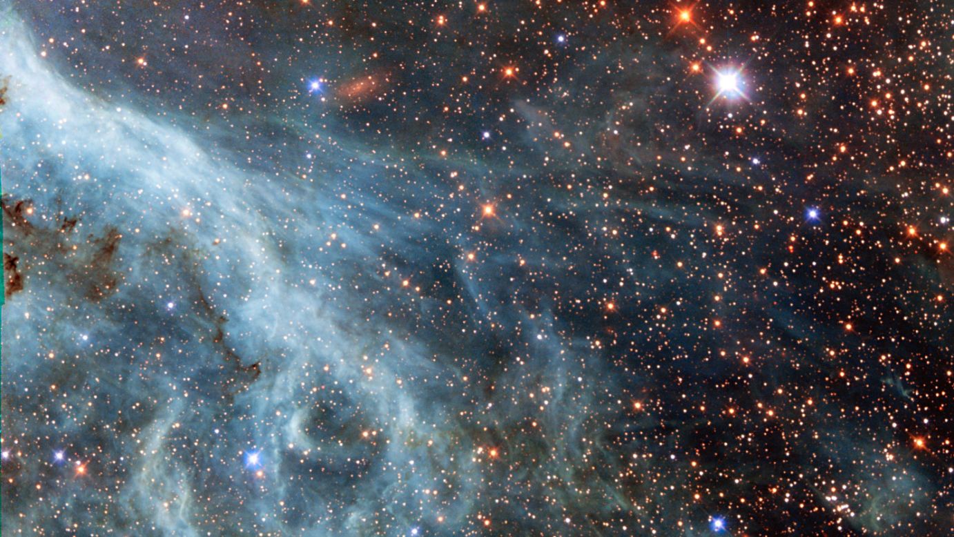 A section of the Tarantula Nebula, located within the Large Magellanic Cloud, is seen in this undated image taken by the Hubble Space Telescope and released by NASA on Tuesday, October 21. The Large Magellanic Cloud is a small galaxy that orbits our galaxy and appears as a blurred blob in our skies, according to NASA.