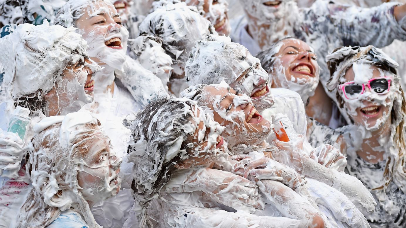 Students from St. Andrews University in Scotland cover themselves in foam, an annual school tradition, on Monday, October 20.