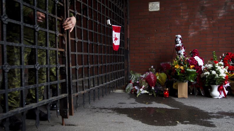 In memory of Nathan Cirillo, the Canadian army reservist who was fatally shot in Ottawa on Wednesday, October 22, flowers were placed at a memorial outside the gates of the John Weir Foote Armory in Hamilton, Ontario.