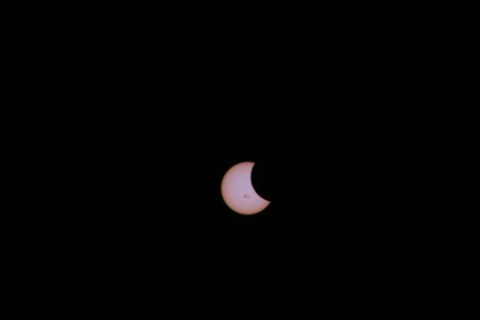 For more than an hour, engineer <a href="http://ireport.cnn.com/docs/DOC-1182662">Nicholas Koehne</a> waited to photograph the partial solar eclipse in Topeka, Kansas. Using a solar filter, he was able to capture several images of the event.
