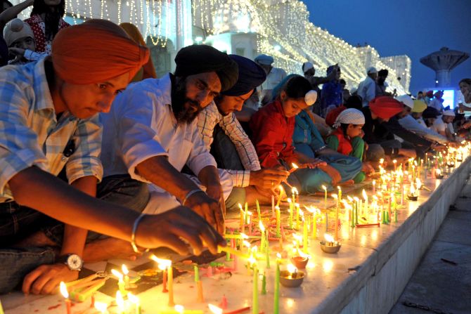 Indian Sikhs celebrate Diwali to mark the return of the sixth Guru, Hargobind Ji, who is said to have released 52 political prisoners while being freed from his own imprisonment from Gwalior Fort by Mughal Emperor Jahangir in 1619. 