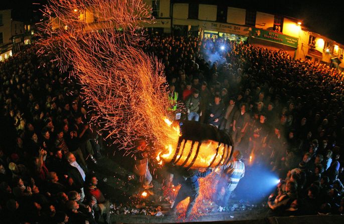 Every year on November 5, flaming barrels of tar are carried through the streets of Ottery St. Mary in southwestern England.