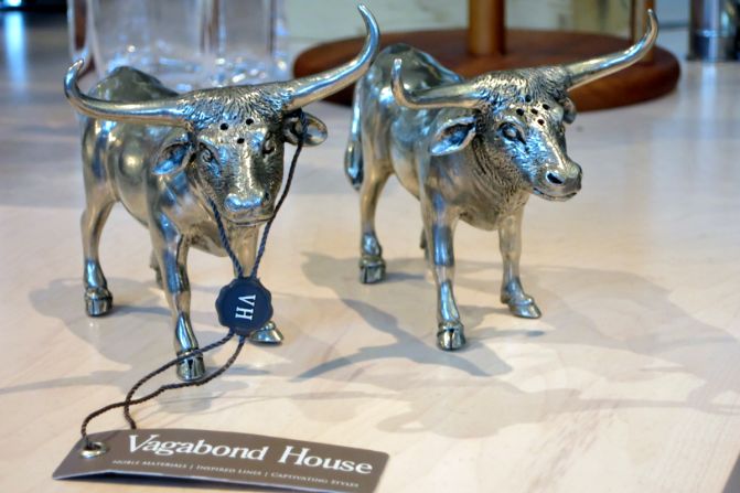 The Omni Dallas hotel Collections gift shop stocks an assortment of items crafted by Dallas artisans, including these pewter salt and pepper shakers shaped like longhorn steers.