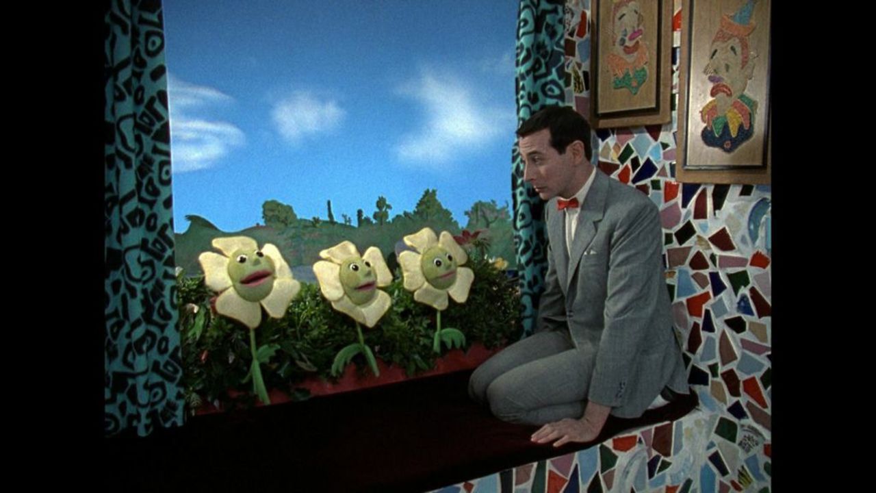 Pee-wee and the window box flowers have a heart-to-heart-to-heart-to-heart.