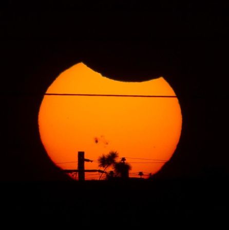 <a href="http://ireport.cnn.com/docs/DOC-1182661">Mike Fraietta </a>started photographing lunar and solar eclipses when he was a teenager. The 58-year-old photographed Thursday's partial solar eclipse from Clear Lake City, Texas.  