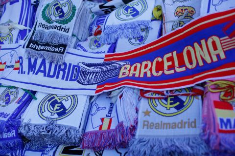 A sea of El Clasico scarves on sale outside the Bernabeu Stadium before Saturday's match. 