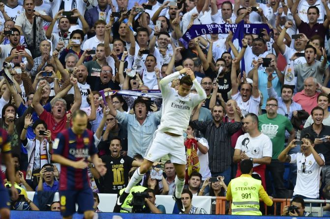 Cristiano Ronaldo celebrates scoring Real Madrid's equalizer in front of an ecstatic home crowd. His 35th minute penalty brought an end to Barcelona keeper Claudio Bravo's record of eight clean sheets in the opening eight matches of the La Liga season.