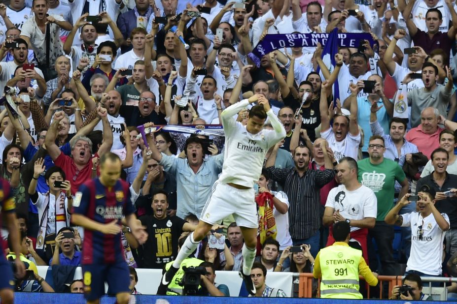 Cristiano Ronaldo celebrates scoring Real Madrid's equalizer in front of an ecstatic home crowd. His 35th minute penalty brought an end to Barcelona keeper Claudio Bravo's record of eight clean sheets in the opening eight matches of the La Liga season. 