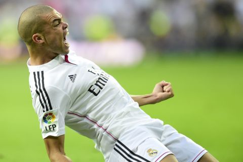 Pepe celebrates after giving Real Madrid the lead at the start of the second half. The defender's header was his first goal against Barcelona.  