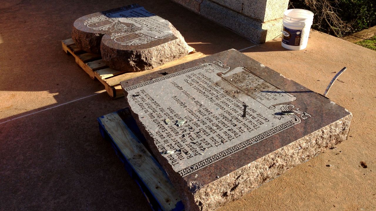 The damaged remains of a Ten Commandments monument are gathered on the Oklahoma State Capitol grounds Friday, Oct. 24, 2014 in Oklahoma City. 