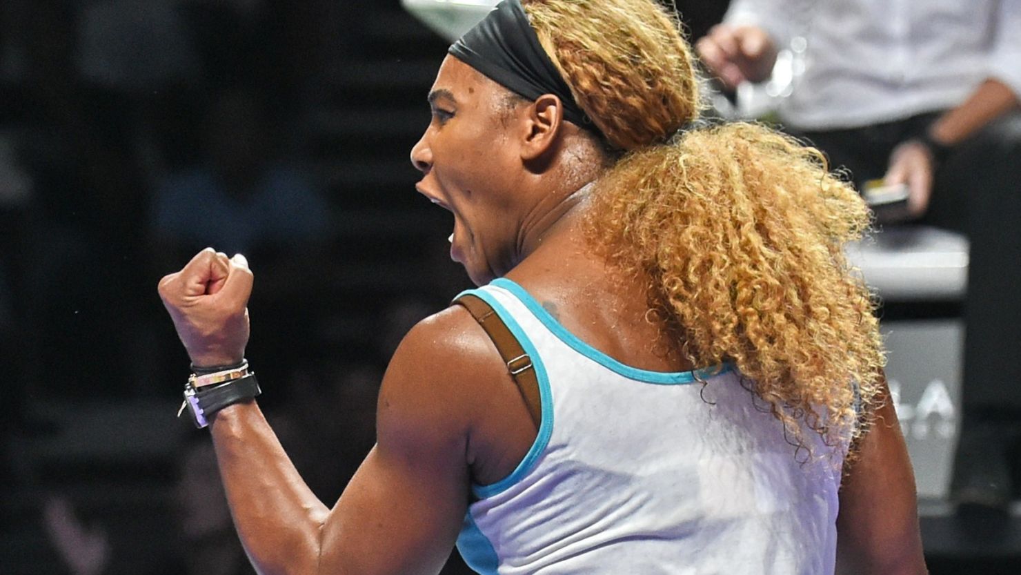 A pumpled up Serena Williams beats Simona Halep to win the WTA Finals title in Singapore.
