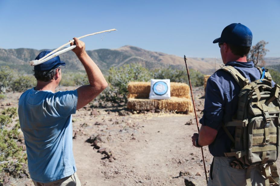 Rowe visited a survival school, where Thomas Coyne gave him a spear-throwing lesson.