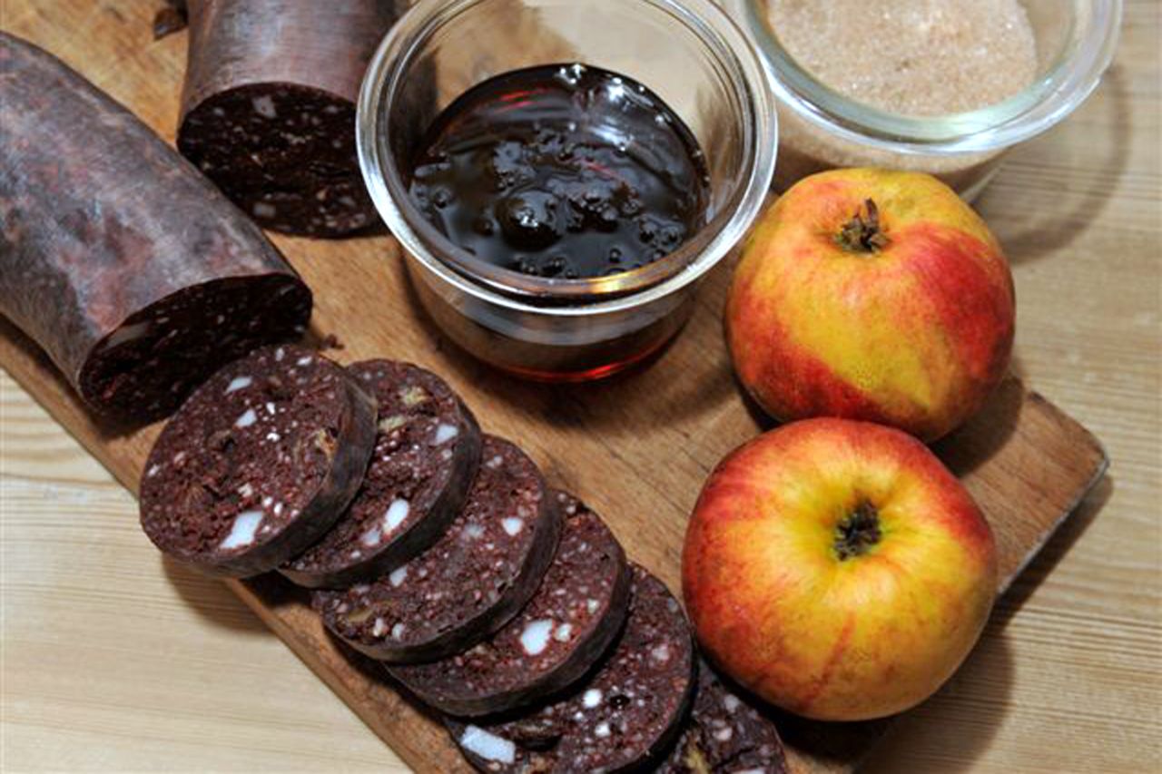 The Danish take on blood pudding, Blodpølse is a mixture of blood, milk, sugar, raisins and cinnamon. Eaten as a dessert, the sweet sausage is served with apples, butter cinnamon and syrup.