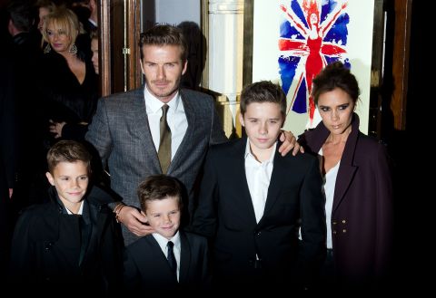 The Beckham brood is a stylish one -- Victoria and David pose alongside children Romeo, Cruz, and Brooklyn. In 2011, Victoria gave birth to daughter Harper Seven. 
