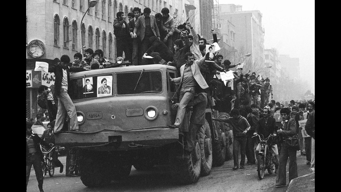 Demonstrators celebrating the Shah's departure flood the streets of Tehran on January 17, 1979.