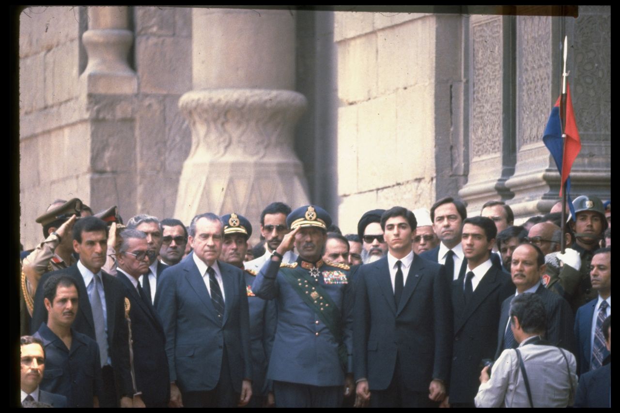Former U.S. President Richard Nixon stands with Sadat, center, and Iranian Crown Prince Reza at the Shah's funeral in Cairo. The Shah died of cancer on July 27, 1980.