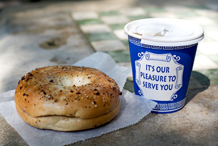 Every morning, locals file out of the subway and beeline for silver breakfast carts, whose narrow shelves are stocked high with bagels and pastries.