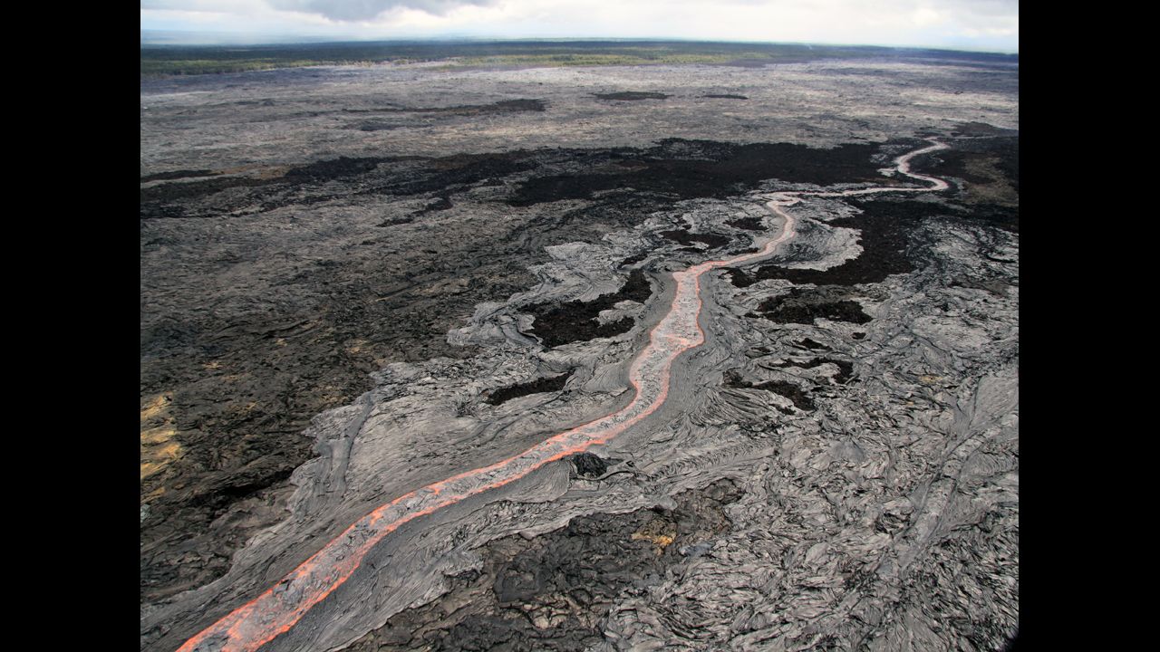 A view of the sinuous, channelized flow that was moving to the northeast from Kilauea on June 27. The flow threatening Pahoa has advanced about 13 miles (21 kilometers) since then. Kilauea is one of the world's most active volcanoes.