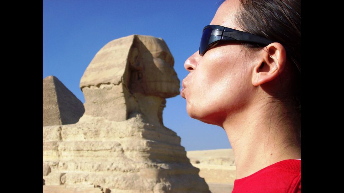"I think I'm a bit too young for him," says Alla Shubina, <a href="http://ireport.cnn.com/docs/DOC-1174084">who kissed the Great Sphinx</a> of Giza during her 2010 trip to Egypt. Click the arrows to see a <a href="http://ireport.cnn.com/topics/1169748">collection</a> of<a href="http://www.viralnova.com/forced-perspective-photos/" target="_blank" target="_blank"> forced perspective</a> photography from travel destinations around the world.