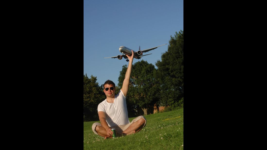 After spending the afternoon watching planes descend at London's Heathrow Airport, Gary Mantile tried to "catch" a plane. Flickr member Lee Mackey directed Mantile on where to position his hand. It took five tries to master this <a href="http://ireport.cnn.com/docs/DOC-1183904">feat of airplane wizardry</a>.