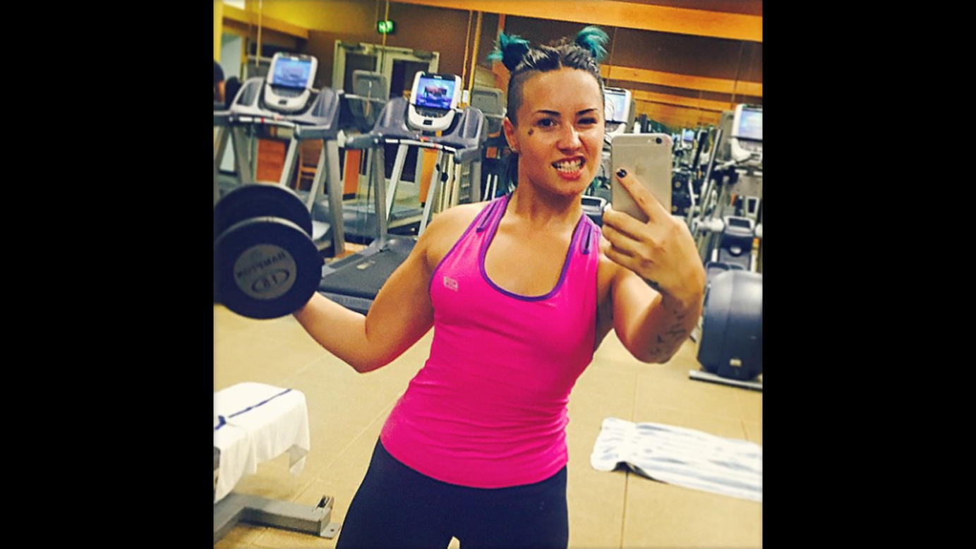 Actress Demi Lovato lifts weights Friday, October 24. "Post party workout.. pullin' my best Pop-eye... I've been eating my spinach!" <a href="http://instagram.com/p/uhiE2kuKpa/?modal=true" target="_blank" target="_blank">she wrote</a> on Instagram.