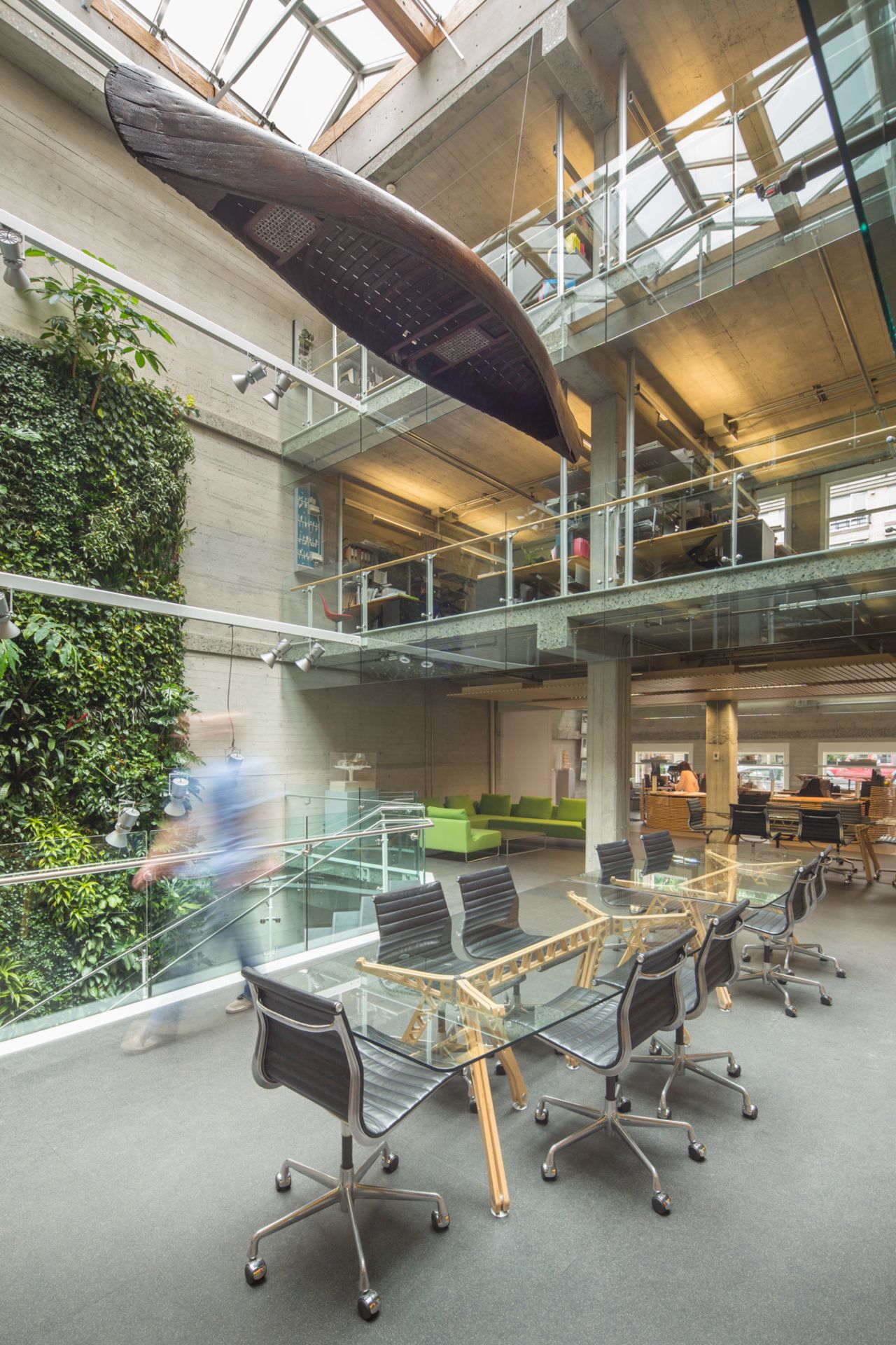 Architects Perkins and Will installed a vertical green wall in the foyer of their Vancouver office. Among the benefits of walls like these are improved air quality, sound insulation, temperature regulation and stress reduction.