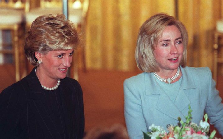 Suit jackets and pearl necklaces are the outfits of choice for Princess Diana and then-U.S. First Lady Hilary Clinton at a White House reception in 1996. The exhibition features a black, sequined Jacques Azagury dress worn by Diana on her 36th birthday. 