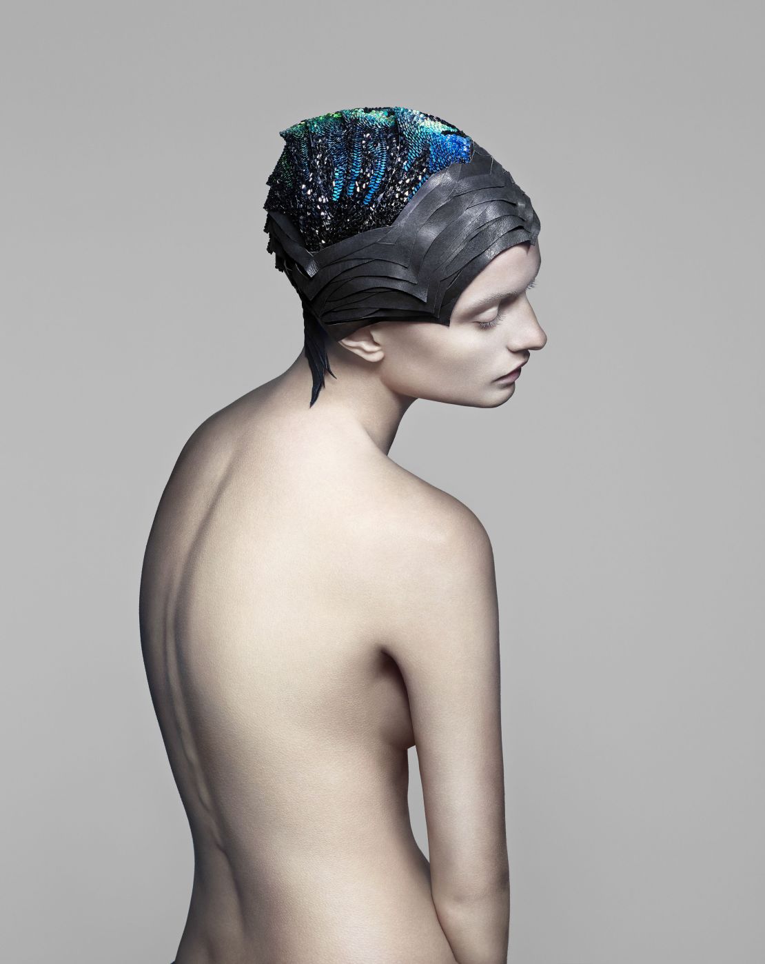 This headpiece, made of 4000 conductive Swarovski stones, changes color to correspond with localized brain activity.